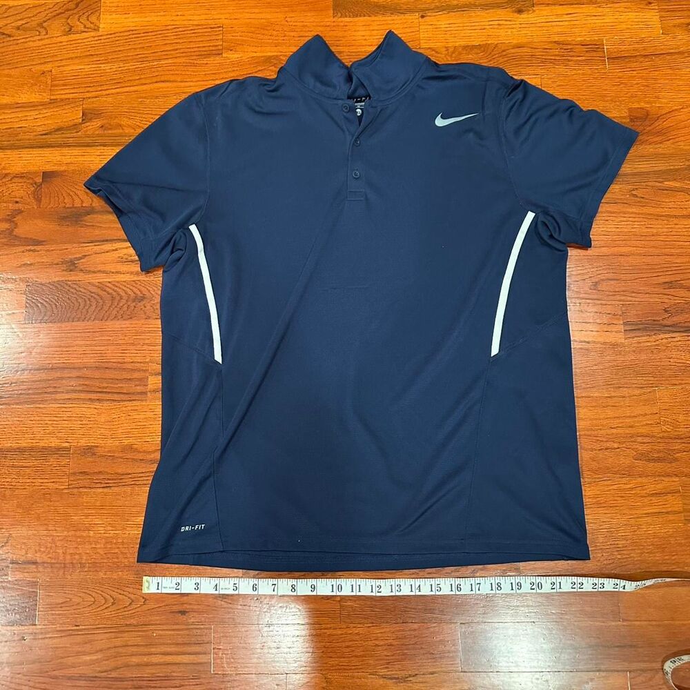 Navy Nike Dri-Fit polo shirt with white stripes